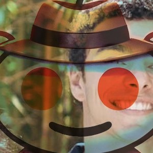 Overlay of a Reddit logo detective hat on a Luigi Mangione’s face, symbolizing investigative internet culture